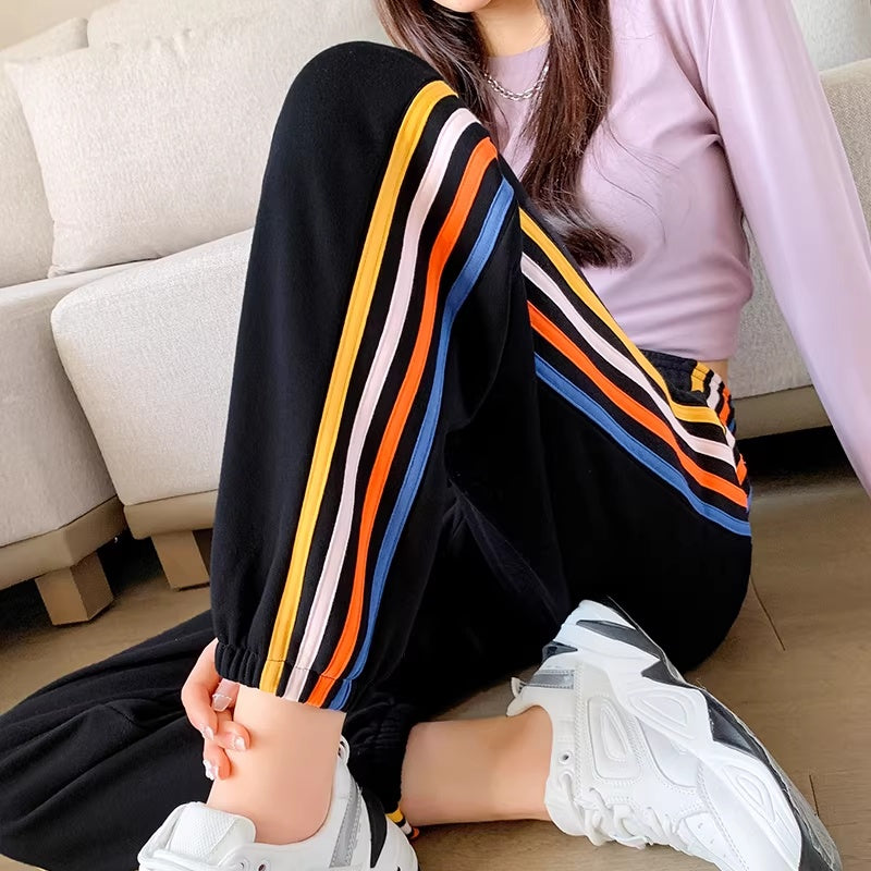 High-waisted Ankle-tied Joggers With A Gray-and-white Rainbow Stripe Design