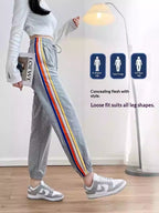 High-waisted Ankle-tied Joggers With A Gray-and-white Rainbow Stripe Design