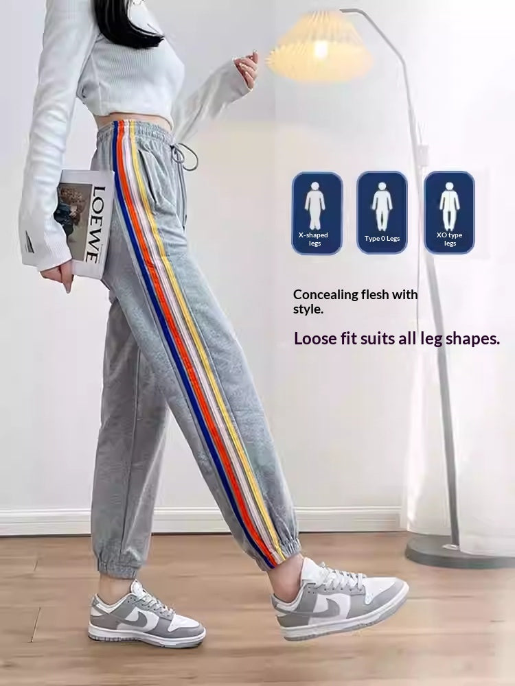 High-waisted Ankle-tied Joggers With A Gray-and-white Rainbow Stripe Design